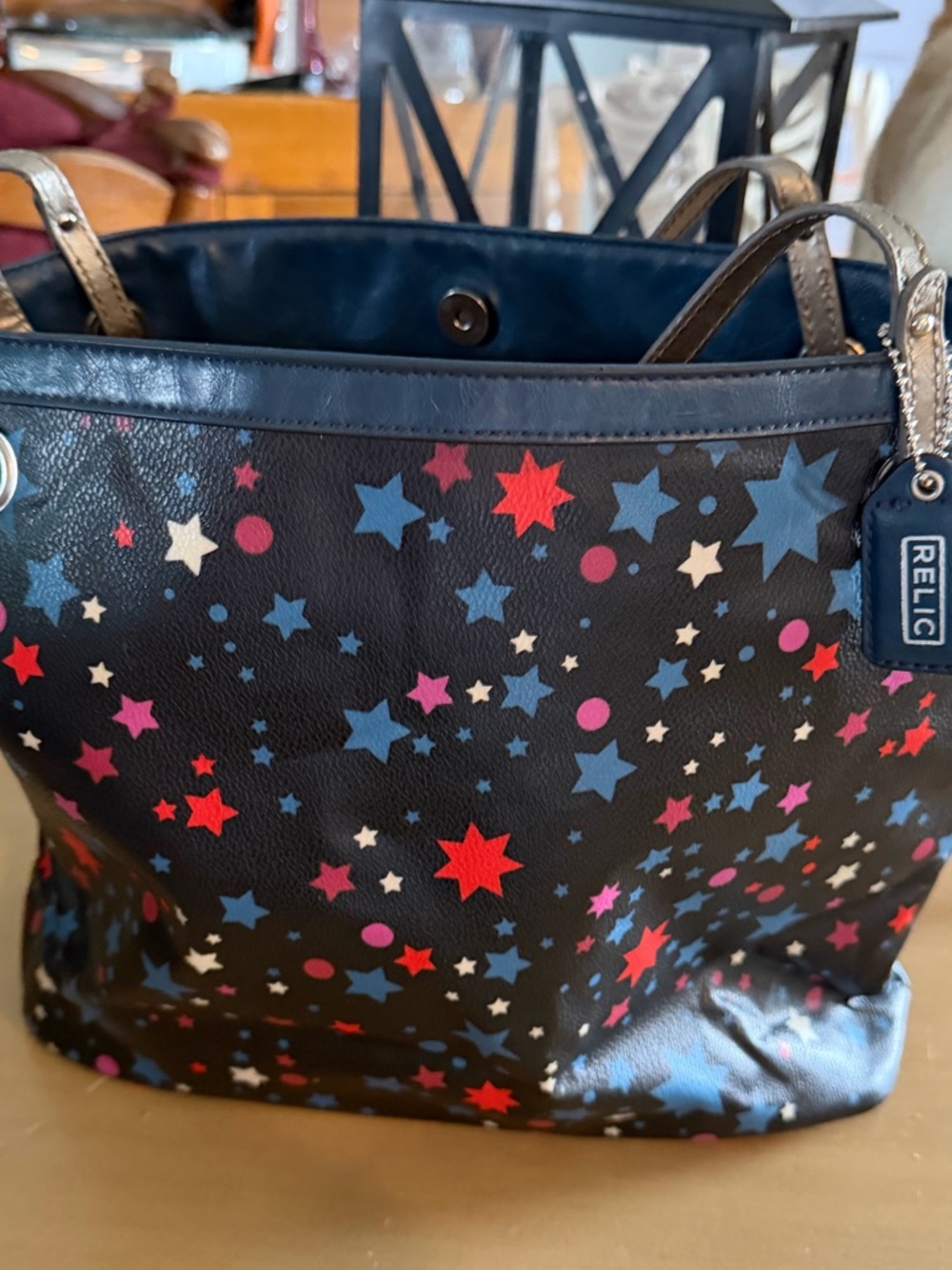 Relic Black Tote with Red, Blue & Pink Star Print